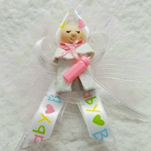 One dozen Baby Shower Pins assorted models.