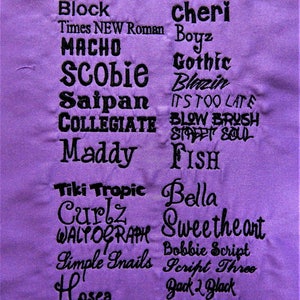 May include: A purple fabric swatch with a black font chart listing various font names and styles. The chart includes fonts such as Block, Times New Roman, Gothic, Blazin, Blow Brush, Street Soul, Fish, Bella, Sweetheart, Bobbie Script, Script Three, Back 2 Black, and more.