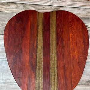 Apple shaped charcuterie board in  padauk and walnut