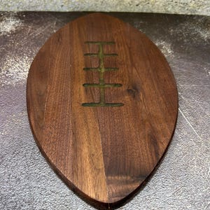 Walnut football charcuterie board