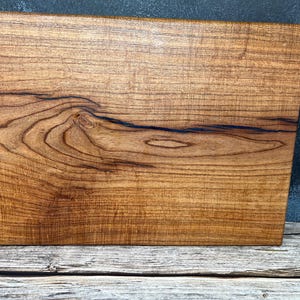 Mesquite cutting board with blue inlay