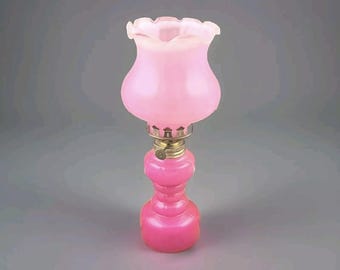 Vintage kerosene table oil Lamp with pink globe glass and brass light