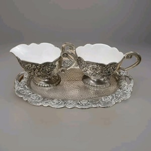 Creamer and sugar set on tray silver plate white enameled inside rare