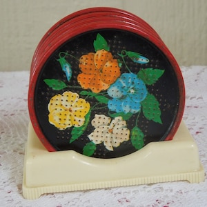 Vintage Floral Coaster Set. 8 Round Metal Coasters. Plastic Holder.