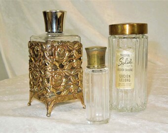 Vintage Perfume Bottles. Metal Gold Tone Filigree Holder. Lucien LeLong Tailspin Solid Brand Stick Cologne. Set of 3.