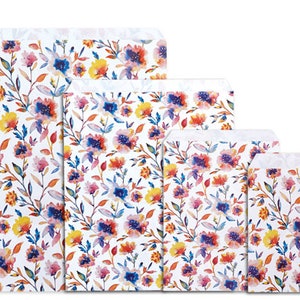 May include: Set of four white paper gift bags with a watercolor floral pattern in shades of pink, blue, yellow, and orange.