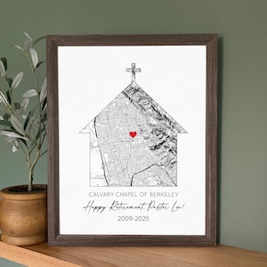 May include: Framed print featuring a map of Berkeley, California, shaped like a church with a cross on top. The print includes the text "Calvary Chapel of Berkeley" and "Happy Retirement, Pastor Lee!" with the years 2009-2025.