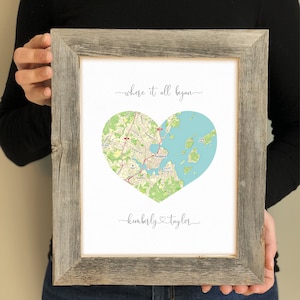 May include: A framed print with a map of Portland, Maine, in the shape of a heart. The text "where it all began" is above the map and "kimberly ♥ taylor" is below the map.