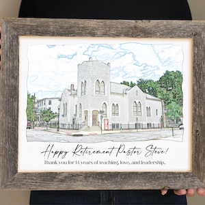 May include: A framed drawing of a church building with the text "Happy Retirement Pastor Steve! Thank you for 14 years of teaching, love, and leadership."