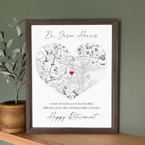 May include: A framed print featuring a heart-shaped map with a red heart marker. The print includes the name "Dr. Jason Harris" and the words "Happy Retirement". The map shows the area around Peabody, Massachusetts.