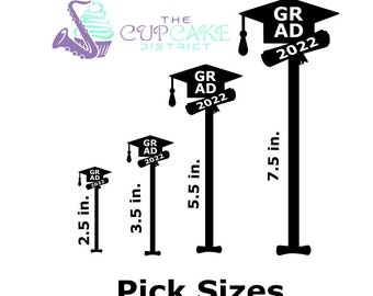 May include: Four black graduation cap toppers with the text "GRAD 2022" in white. The toppers are shown in four different sizes: 2.5 inches, 3.5 inches, 5.5 inches, and 7.5 inches.