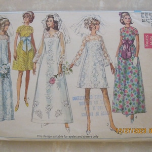 May include: A vintage Simplicity sewing pattern for a junior petite dress. The pattern is for a dress with a lace bodice and a skirt that can be made in either a solid colour or a floral print. The pattern number is 7639 and the size is 5JP. The pattern is suitable for eyelet and sheers.
