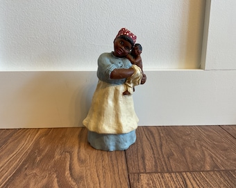 African American woman with baby