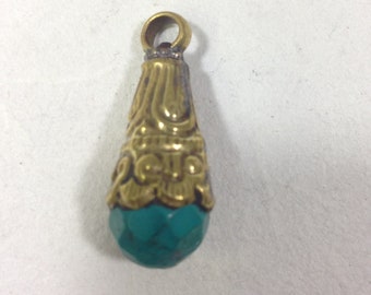 Tibetan Turquoise Embellished Brass Pendant