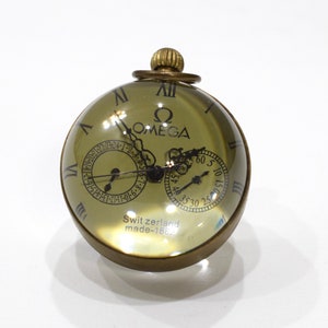 Montre boule omega 1882 prix clearance