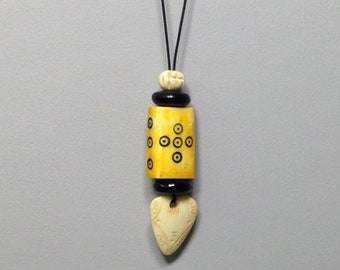 Indonesian Yellow Bone  Horn Cord Pendant Necklace