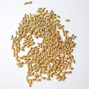 Perline in oro piccole perline tubolari 6 mm