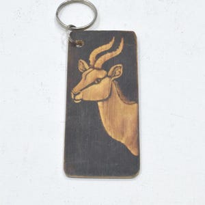 Porte-clés africain en bois sculpté