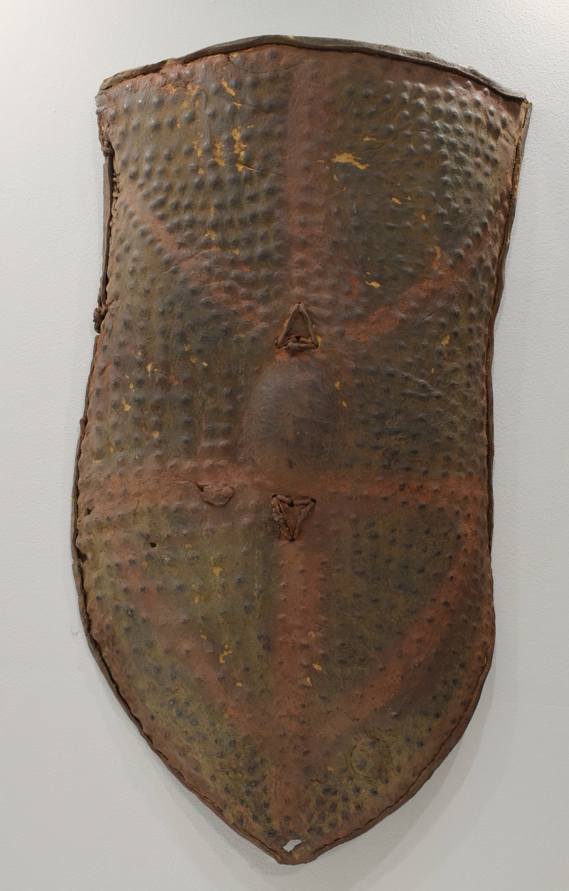 Embossed Metal Kirdi Shield from Cameroon on Bronze Stand Embossed Metal Kirdi Shield from Cameroon on Bronze Stand