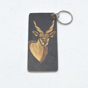 Porte-clés africain en bois sculpté