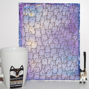 May include: A watercolor painting on canvas featuring a purple and blue gradient background with a pattern of black outlined cats. The cats are arranged in rows and columns, creating a repeating pattern.