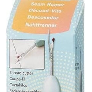 May include: A light blue and grey seam ripper, with the text "Grip Fit" on the packaging. The packaging also includes the Clover logo and the text "Seam Ripper" in multiple languages. The seam ripper is designed for removing threads.