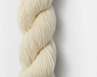May include: A skein of natural white wool yarn.