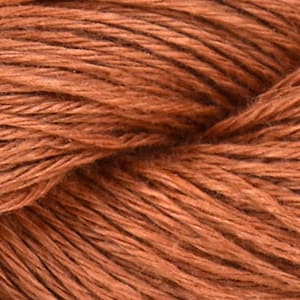 May include: Close-up of a skein of orange-brown yarn. The yarn is made of natural fibers and has a rustic, textured look.