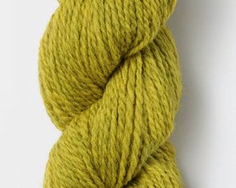 May include: A skein of bright green yarn, twisted into a figure eight shape.