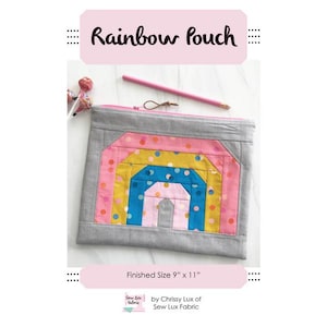 May include: A gray rectangular pouch with a rainbow design. The rainbow is made of pink, yellow, and blue fabric. The pouch is 9 inches by 11 inches. The text "Rainbow Pouch" is at the top.