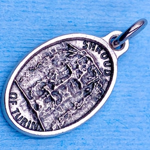Shroud of Turin Medal Centuries Old Linen Cloth that Bears the Image of a Crucified Man. Many People Believe to be Jesus of Nazareth