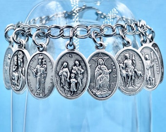 Gift Boxed St and 1 5/8 x 1 inch Crucifix Silver Finish St Luke the Apostle-Doctor Center Luke the Apostle-Doctor Rosary with 6mm Aqua Color Fire Polished Beads Gift Boxed St and 1 5/8 x 1 inch Crucifix Silver Finish St Luke the Apostle-Doctor Center Luke the Apostle-Doctor Rosary with 6mm Aqua Color Fire Polished Beads