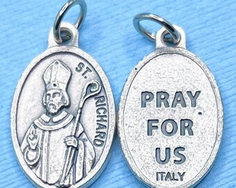 May include: Silver oval-shaped pendant with a depiction of Saint Richard on one side and the words "Pray for Us Italy" on the other side.