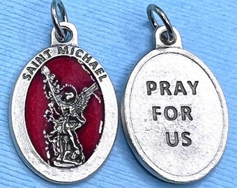 May include: Silver oval pendant with a red enamel image of Saint Michael the Archangel on one side and the words "Pray For Us" on the other side.