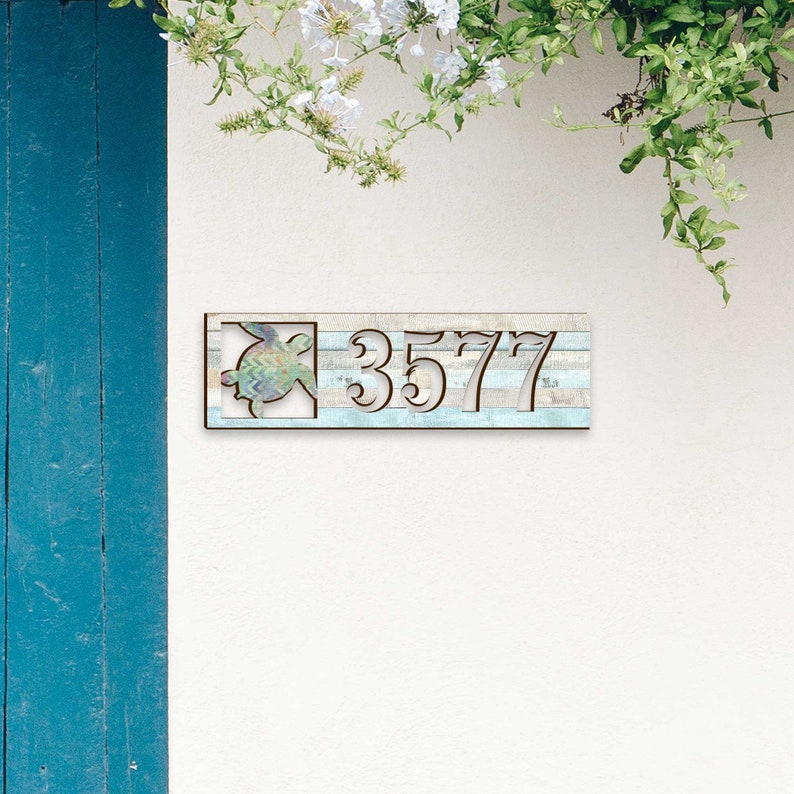 This Sea Turtle House Number Plaque is a stunning and functional piece, perfect for coastal homes, beach houses, and lakefront properties.