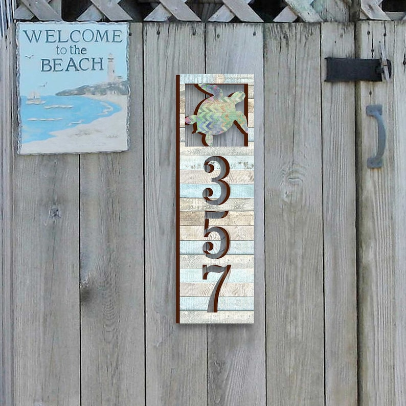 This Sea Turtle House Number Plaque is a stunning and functional piece, perfect for coastal homes, beach houses, and lakefront properties.