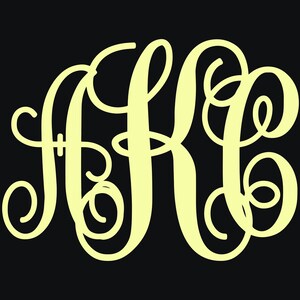 May include: A yellow monogram with the letters A, K, and E intertwined in a decorative script font.
