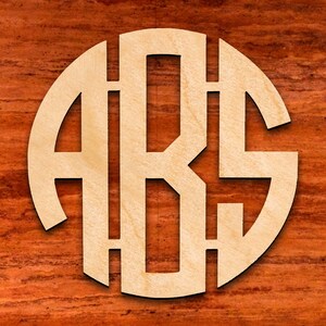 May include: A wooden circle with the letters "A R S" cut out in a monogram style.