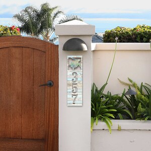 This Sea Turtle House Number Plaque is a stunning and functional piece, perfect for coastal homes, beach houses, and lakefront properties.