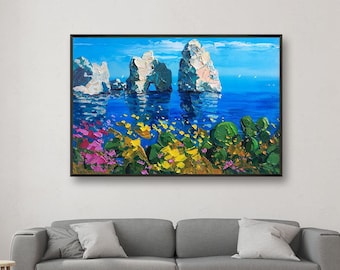 May include: A painting of a seascape with three large rock formations in the distance. The rocks are white and have a blue sky and ocean behind them. The foreground is filled with colorful flowers and greenery.