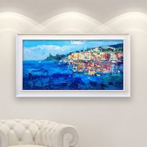 Portovenere oil painting on canvas with rich impasto texture hanging in a modern living room with a white sofa, viewed from a medium distance.
