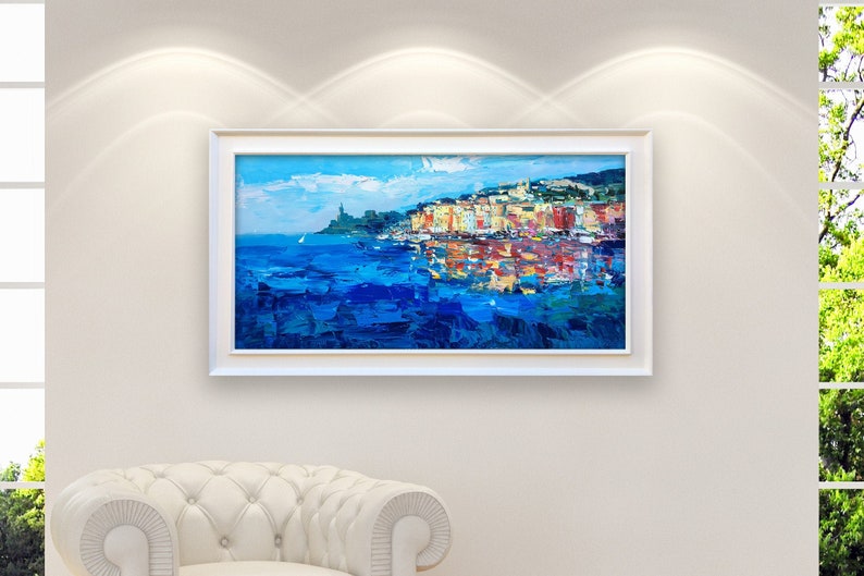Portovenere oil painting on canvas with rich impasto texture hanging in a modern living room with a white sofa, viewed from a medium distance.