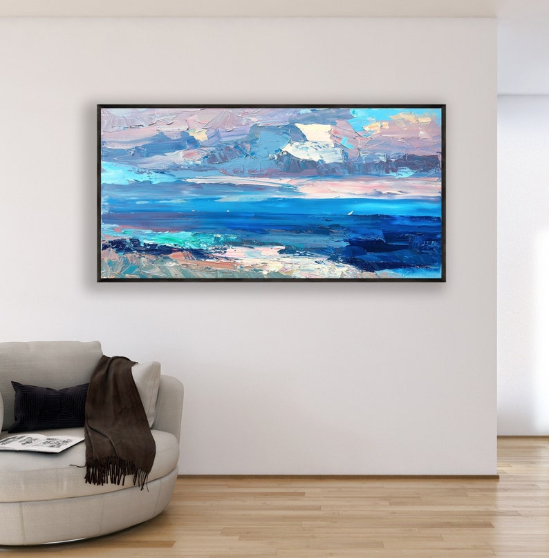 Abstract painting, original oil painting on canvas hanging in a modern living room with a beige sofa and home decor