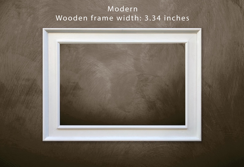 May include: White picture frame with a modern design. The frame is 3.34 inches wide.