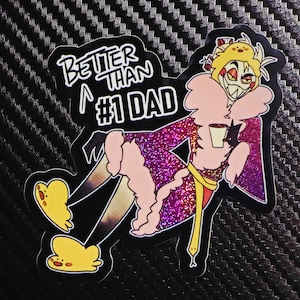 May include: A sticker with a cartoon character in a purple robe with pink fur trim, holding a cup. The text "Better Than #1 Dad" is above the character. The sticker has a black outline and a black background.