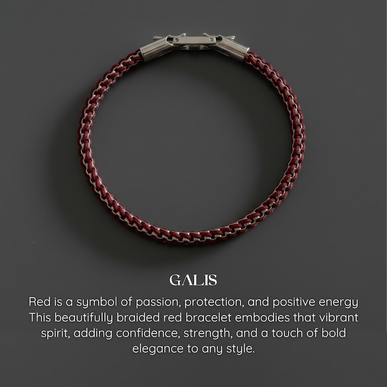 May include: A circular, braided red bracelet with a silver clasp. The bracelet has a woven design. The text "GALIS" is below the bracelet.