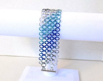 Chainmaille cuff bracelet, blue and white diagonal stripes of European 4-in-1 pattern nickel free anodized aluminum by RainbowMaille