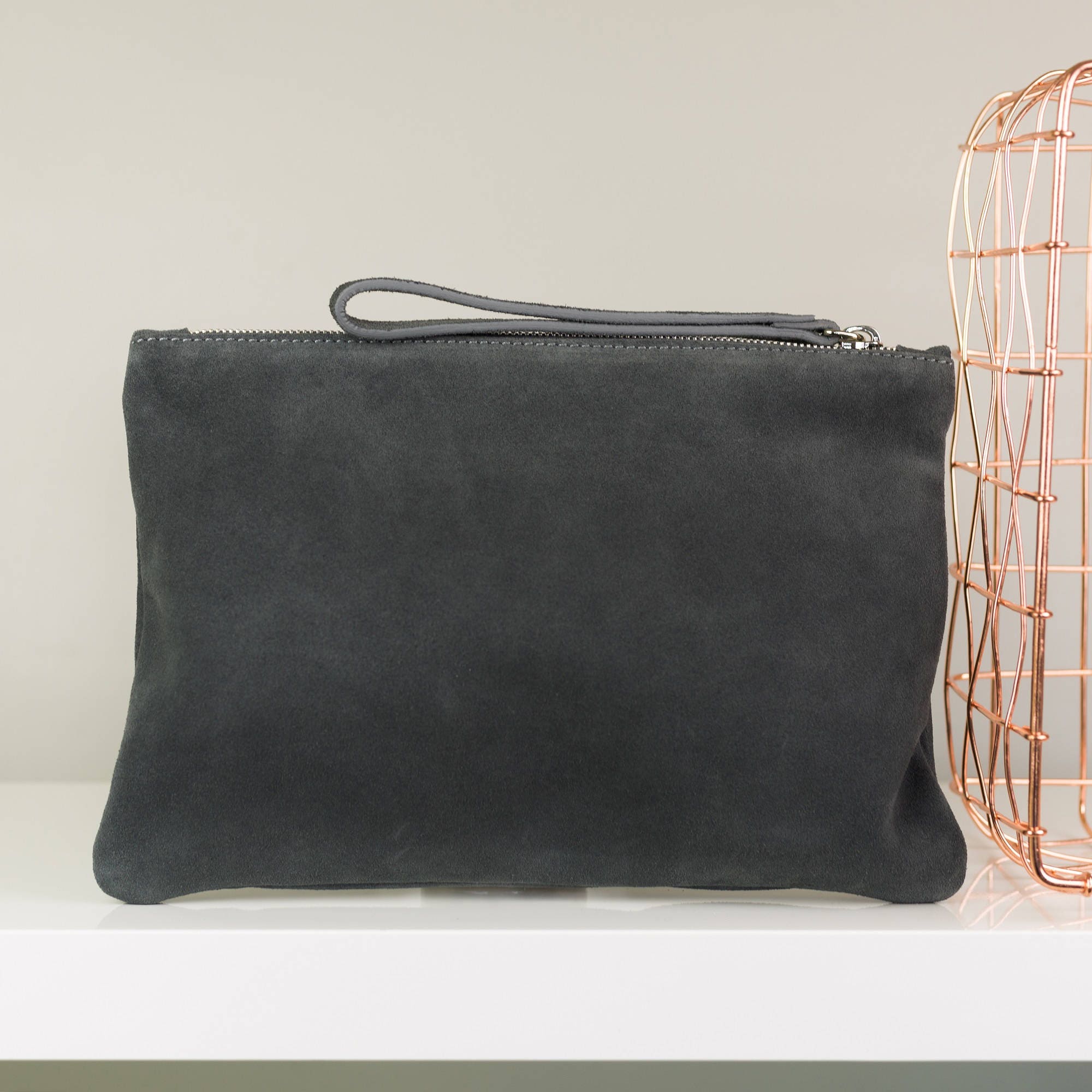 gray suede clutch bag