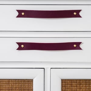 Leather Handles installed on a white dresser.