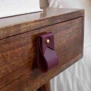 Closeup of a Small Wide Pull installed on a bedside table.
